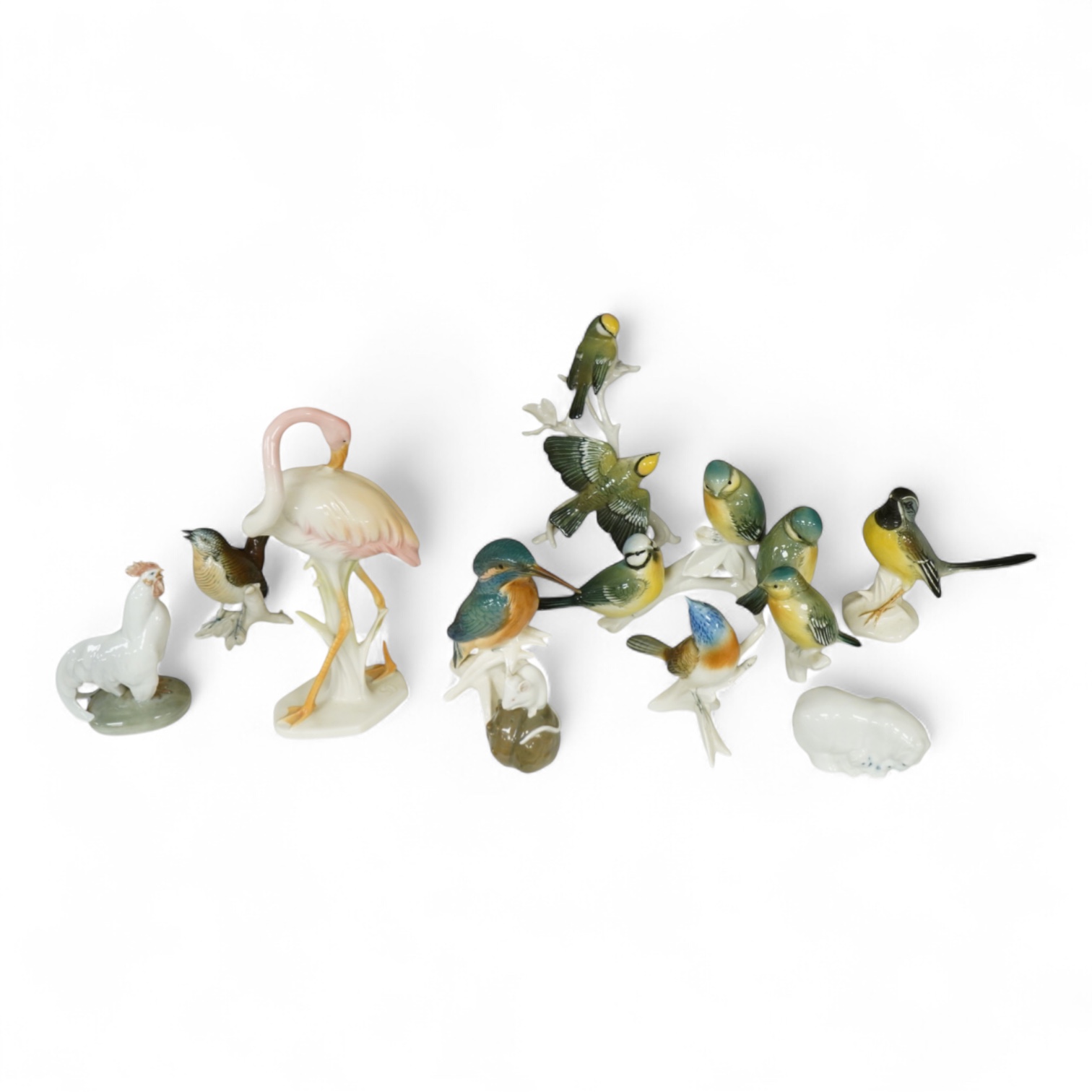 A collection of Copenhagen and other German porcelain birds, tallest 20cm